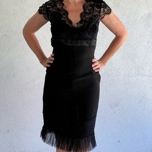 Sharni vintage cocktail dress, runs a size 8. Tulle detail on the hem amazing